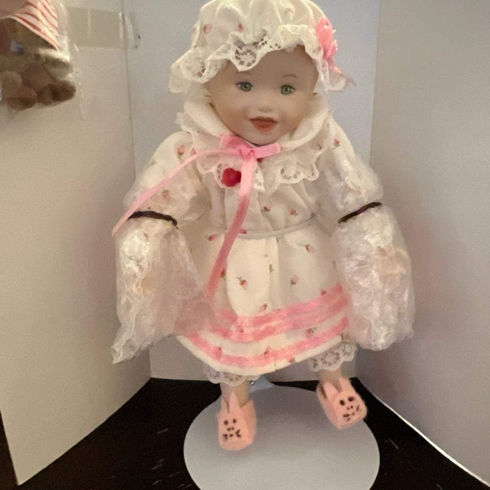 Adorable Porcelain Doll in Pink Dress